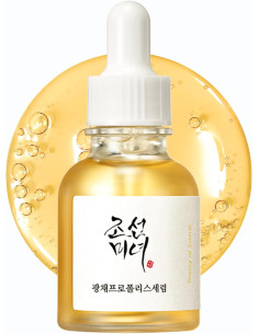 Beauty of Joseon Glow Serum med propolis och niacinamid i glasflaska med pipett och gyllene serum